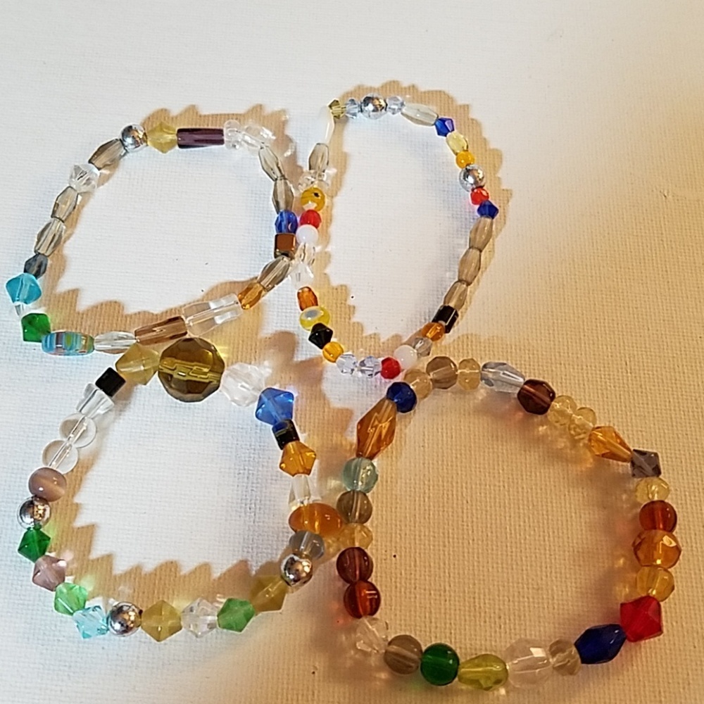 Set 4 Handmade Bead Stretch 8 Bracelets 18$
